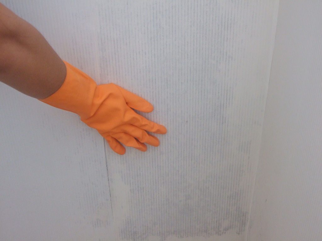 Clean brown ceiling stain with bleach solution